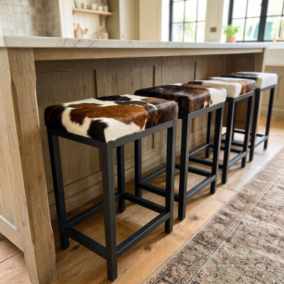 Genuine cowhide and steel stools in counter top or bar height - FP