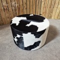 Round cowhide ottoman